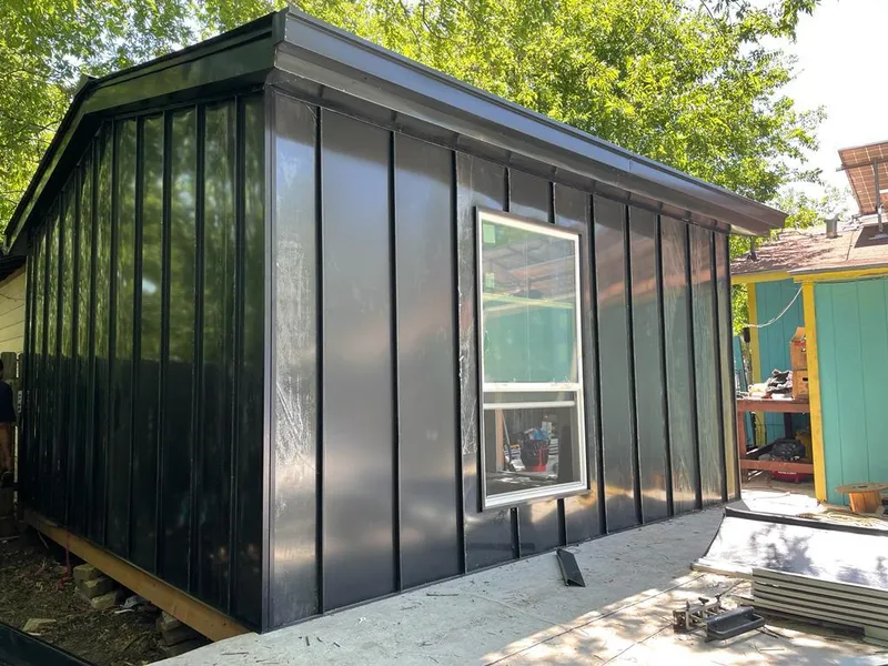 Black standing seam metal wall panels for Roof Inspection in Alhambra